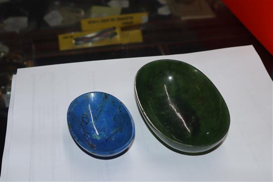 A group of Chinese stone carvings, a spinach green jade dish and a lapis lazuli dish